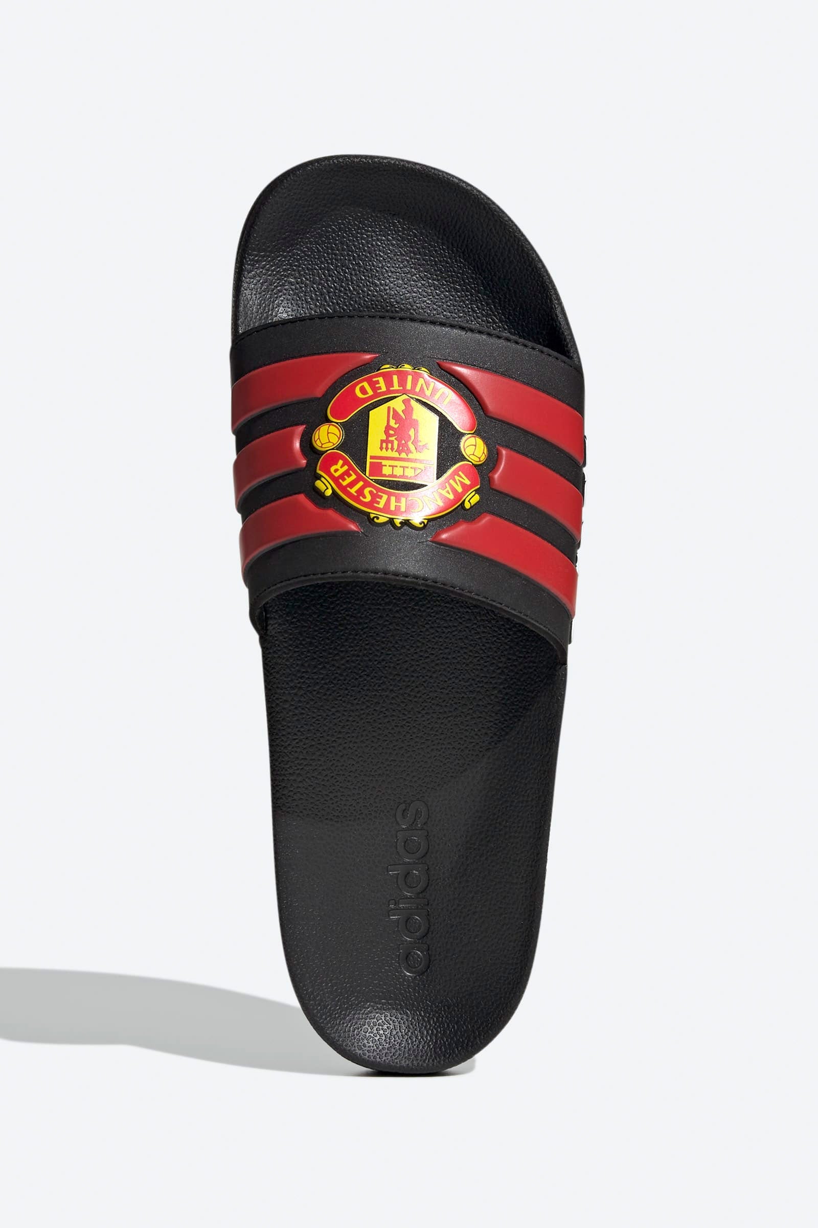Adilette Manchester United Pantoletten - Core Black + Red + Cloud White
